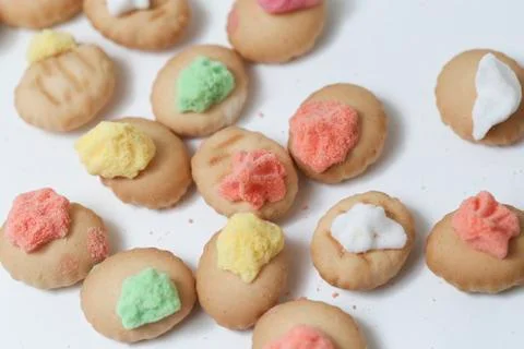 Belly button iced gem biscuits on white background Stock Photos