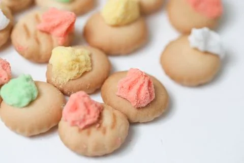 Belly button iced gem biscuits on white background Stock Photos