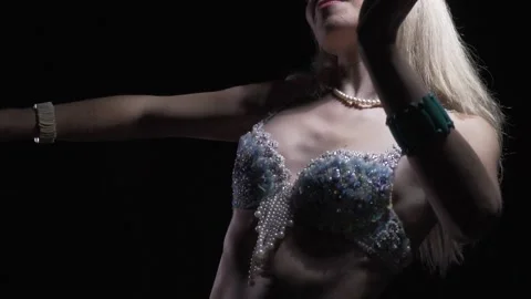 Belly dance from up close, young slim woman in white dress is dancing Stock Footage 138006161