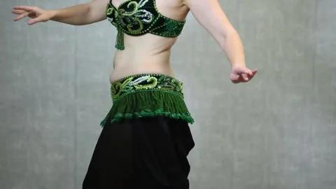 Belly dancer performing basic egyptian with hip drops. Stock Footage 323295317