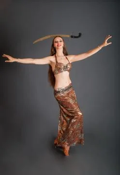 Belly Dancer with Saber on Head at Full Height Stock Photos