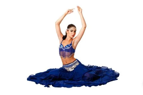 Belly dancer sitting on floor Stock Photos
