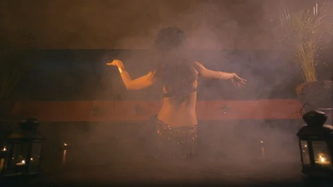 Belly dancer slow motion, warm oriental mood with smoke Video stock 91498291