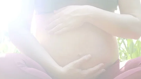 Belly of a pregnant woman Stock Footage