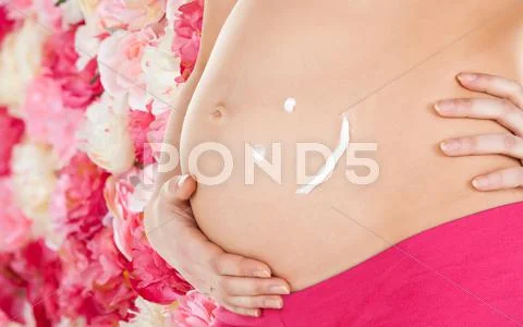 Belly of a pregnant woman Stock Photos