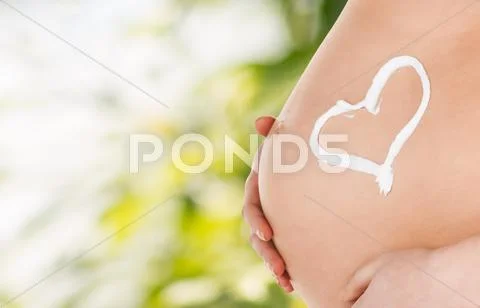Belly of a pregnant woman Stock Photos
