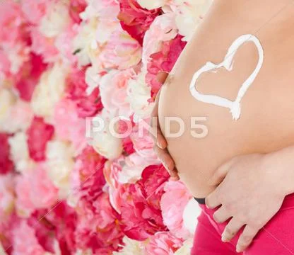 Belly of a pregnant woman Stock Photos