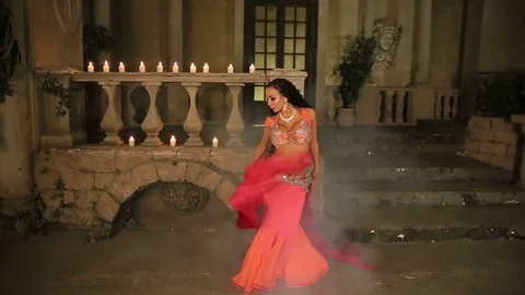 Bellydancer with candles in red dress Stock Footage 80129068
