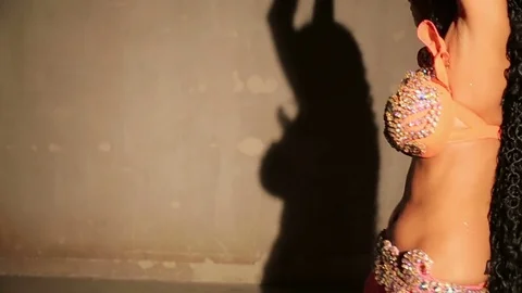 Bellydancer close up and shadow Stock Footage 80129630
