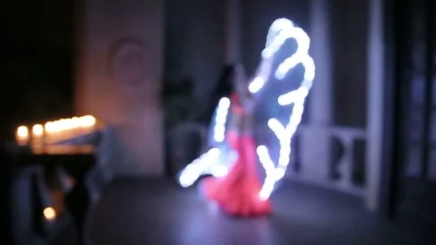 Bellydancer with led light butterfly Stock Footage 80129938