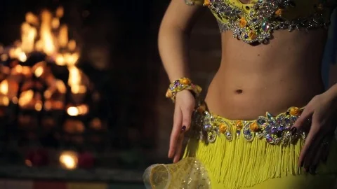 Bellydancer with perfect body dances active inside restaurant Stock Footage 70578589