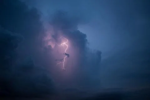 BELO HORIZONTE, BRAZIL - Oct 25, 2021: Lightning burst through dense clouds Stock Photos