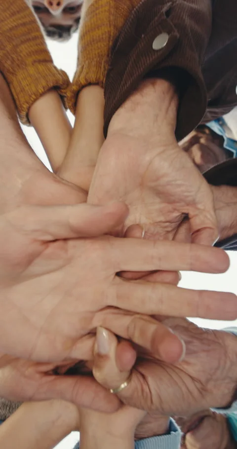 Below, flare and hand stack with people outdoor together for solidarity, support Stock Footage 342317735
