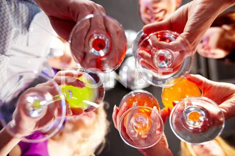 Below view of people clinking glasses with each other Stock Photos
