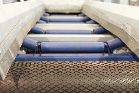 Belt conveyor for sorting garbage. Stock Photos