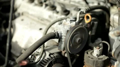 Belt in engine spinning pulley Stock-Footage 10579419