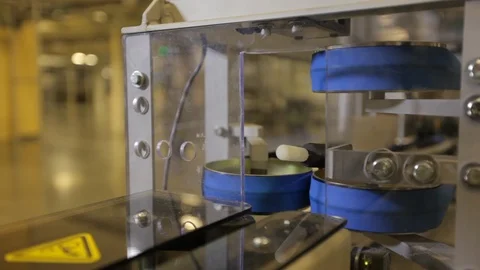 Belt transporting small packages. Going through warehouse checkpoint Stock Footage 102186215