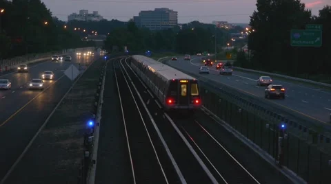 Beltway traffic train dusk 스톡 동영상 66897516