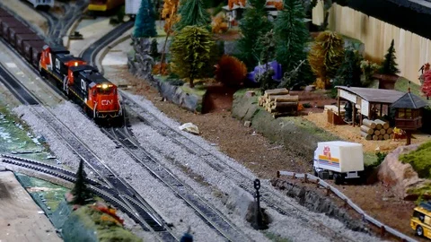 BEMIDJI, MN - 14 MAY 2016: Toy Train Models Operating On Mockup Railroad Set. Stock Footage 106103225