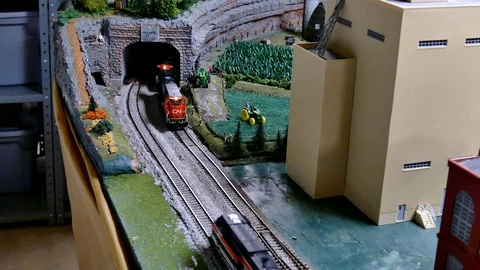 BEMIDJI, MN - 14 MAY 2016: Toy Train Models Operating On Mockup Railroad Set Stock Footage 106103457