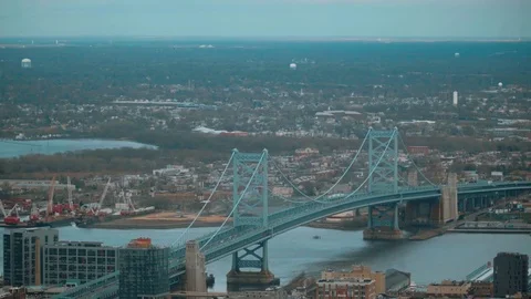 Ben Franklin Bridge over Delaware River in Philadelphia Stock Footage 75350302