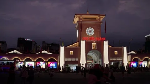 Ben Thanh Market clock tower illuminated at the main entrance plaza near Le Loi Stock Footage 331286184
