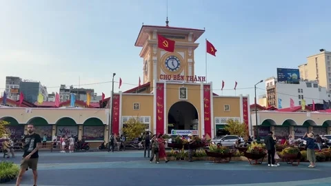 Ben Thanh Market Clock Tower Entrance in Ho Chi Minh City, Vietnam at Sunset 스톡 동영상 338176174