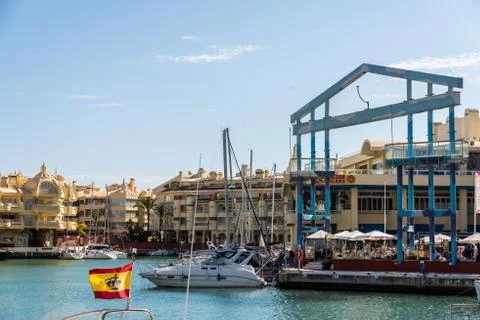 BENALMADENA, SPAIN - MAY 10, 2018  Luxury boats and apartments in marina bay  Stock Photos