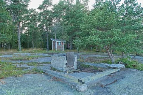 Bench and fireplace. Stock Photos