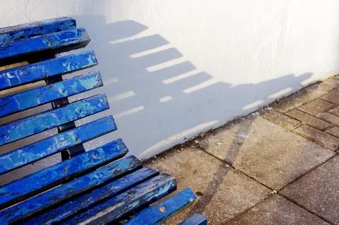 Bench and shadow Stock Photos