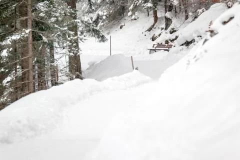 Bench and snow Stock Photos