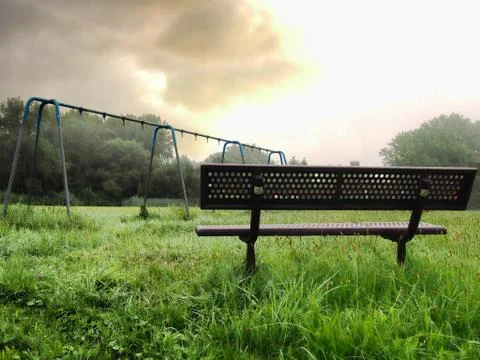 Bench and swing set frame Stock Photos