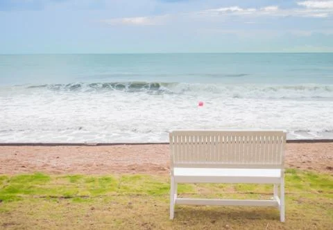 Bench on the beach Stock Photos