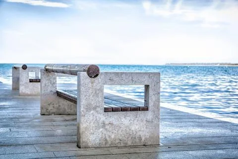 Bench at the beach Stock Photos