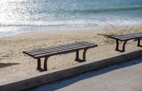 Bench in the beach Stock Photos