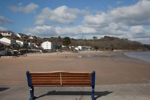 Bench by the beach Stock Photos