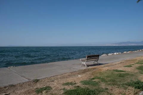 Bench on the beach Stock Photos