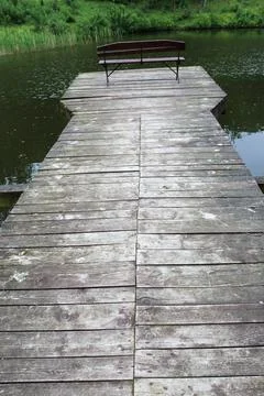 Bench on the bridge Stock Photos