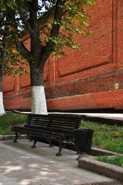 Bench with cast iron base. Stock Photos
