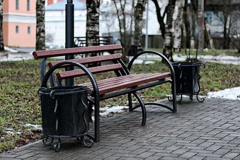 Bench in the city in spring 写真素材