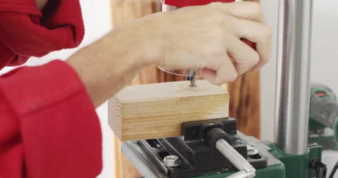 Bench drill, worker drilling hole Stock Footage 241564015