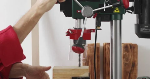 Bench drill, worker drilling hole Stock Footage 241564722