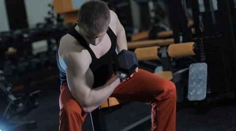 Bench dumbbell sitting Stock Footage 62744663