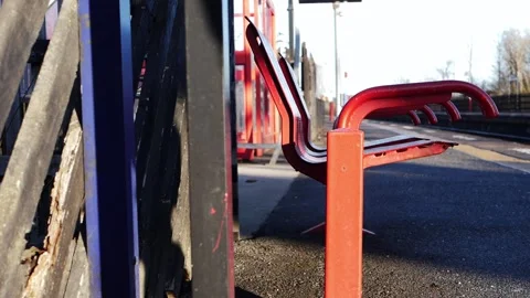 Bench on empty railway platform train station Stock Footage 168614669