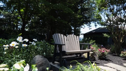 Bench in foliage slider slow motion Stockbeeldmateriaal 91900728