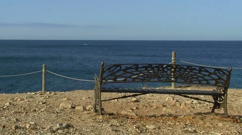 Bench in front of the blue sea Stock Footage 29161397