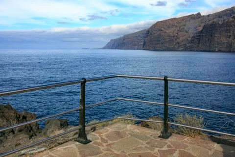 Bench in front of the sea Stock Photos
