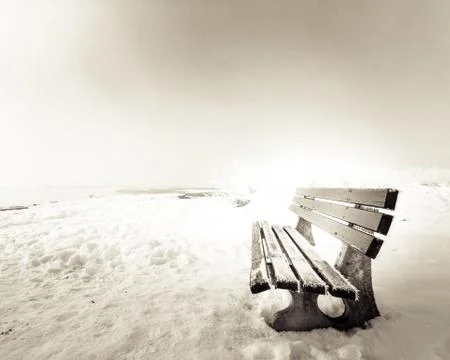 Bench with ice, lake chiemsee Foto stock