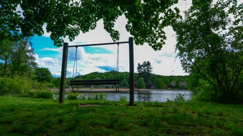 Bench by the Lake 4K Stock Footage 22972691