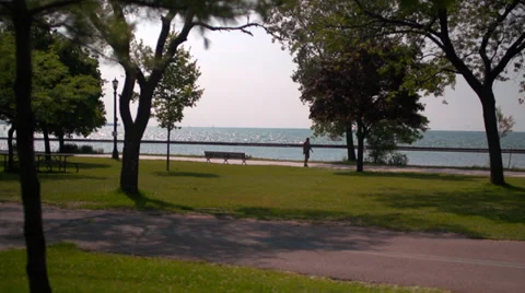 Bench by the Lake Stock Footage 39857145